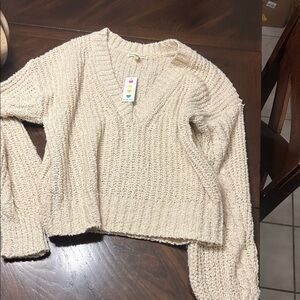 Bouclé V-Neck Sweater in Cream
